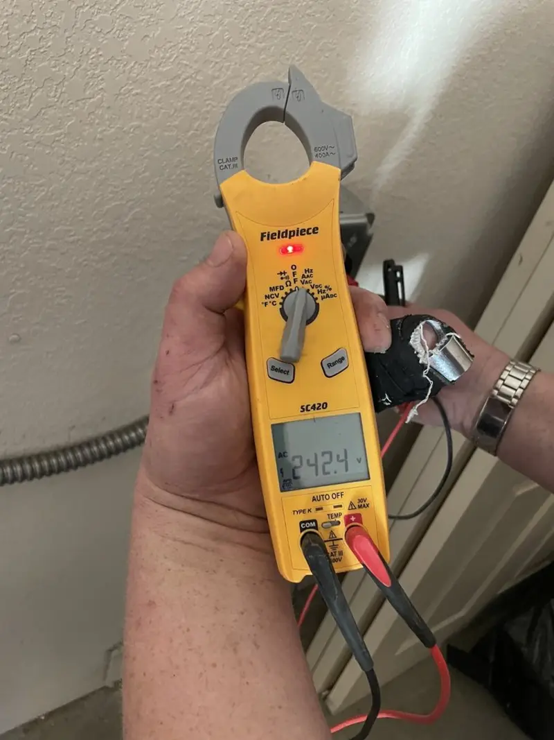 Voltage testing with clamp meter during Generator Installation in Issaquah